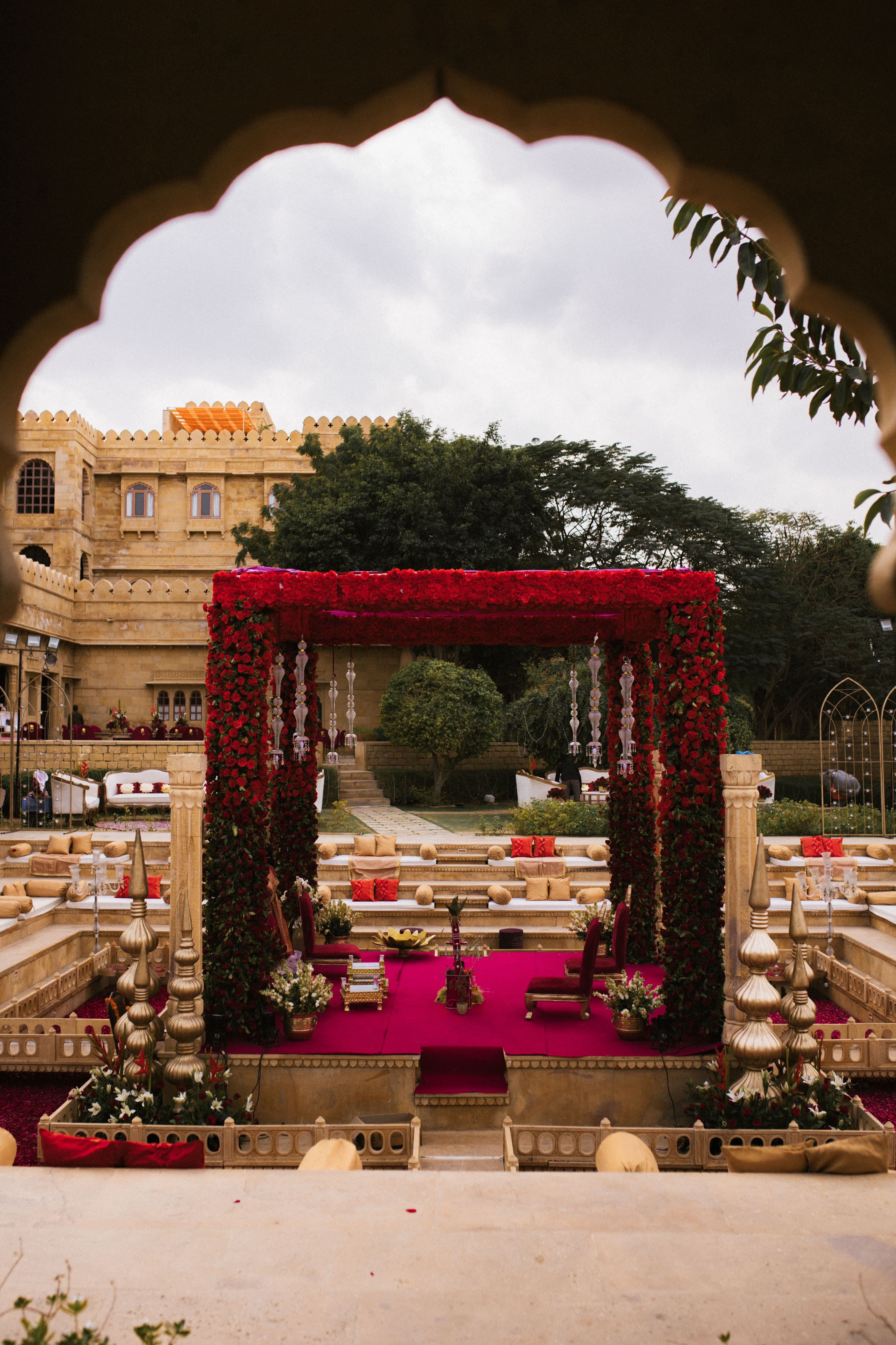 Luxury wedding celebration with draped fabric and florals